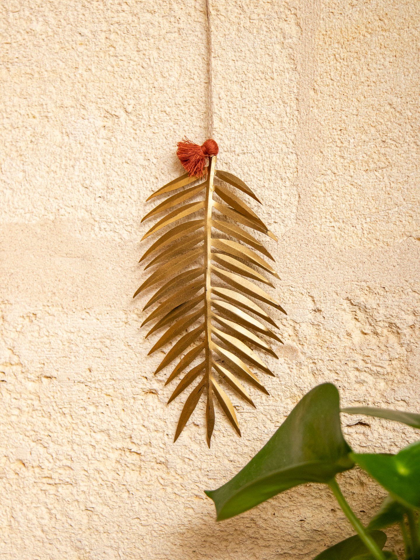 Image illustrative de l'article "Feuille palm susp metal"