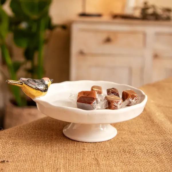 Image illustrative de l'article "Tweet Plateau à gâteau, Blanc"