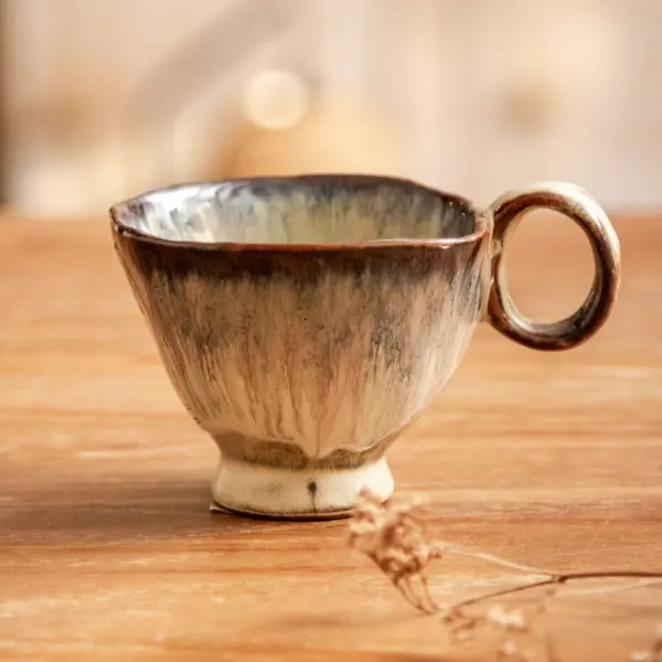 Image illustrative de l'article "Imogen tasse gris"