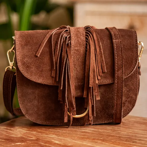 Image illustrative de l'article "Sac marron TOMY"