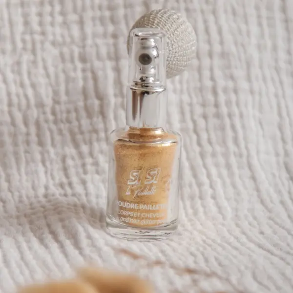 Image illustrative de l'article "Spray Poudre Pailletée – Dorée"