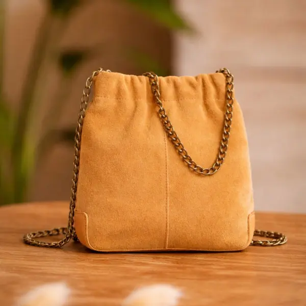 Image illustrative de l'article "Sac bourse cognac BOLETTE – PIECES"