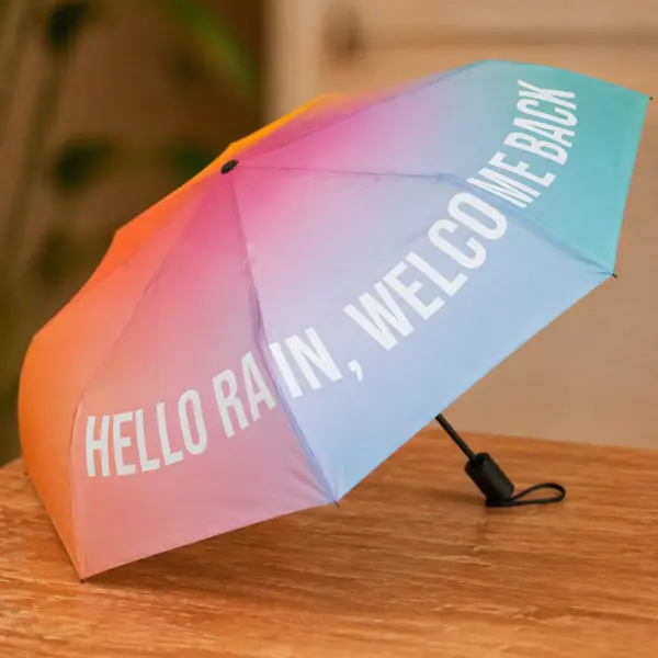 Image illustrative de l'article "Parapluie pliable  »hello rain, welcome back »"