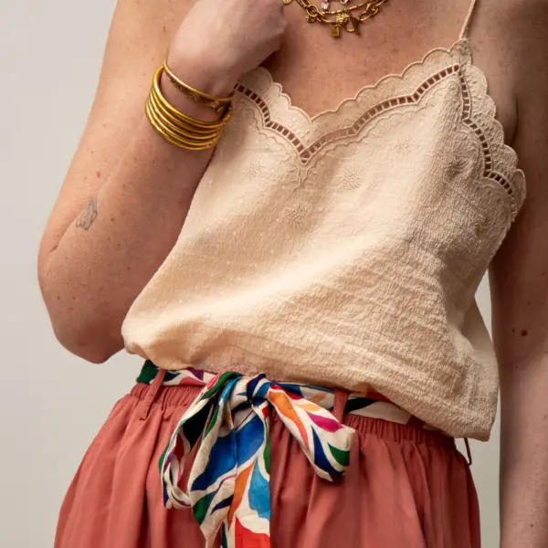 Image illustrative de l'article "Top beige a pois ROXANE"